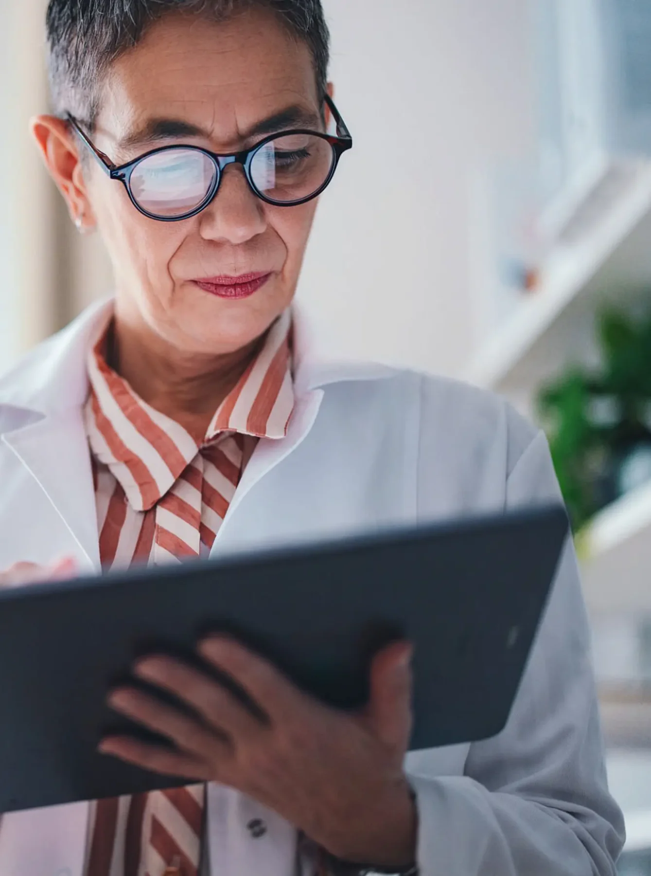 Woman reading a tablet